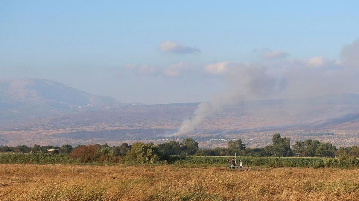 <div class="paragraphs"><p>Smoke rises after rockets were fired from Lebanon, amid cross-border hostilities between Hezbollah and Israel, in the Israeli-occupied Golan Heights. (Representative image)</p></div>