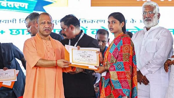 <div class="paragraphs"><p>Uttar Pradesh Chief Minister Yogi Adityanath provides appointment letter to a youth under the district level mega employment and loan fair, in Ambedkar Nagar district.</p></div>