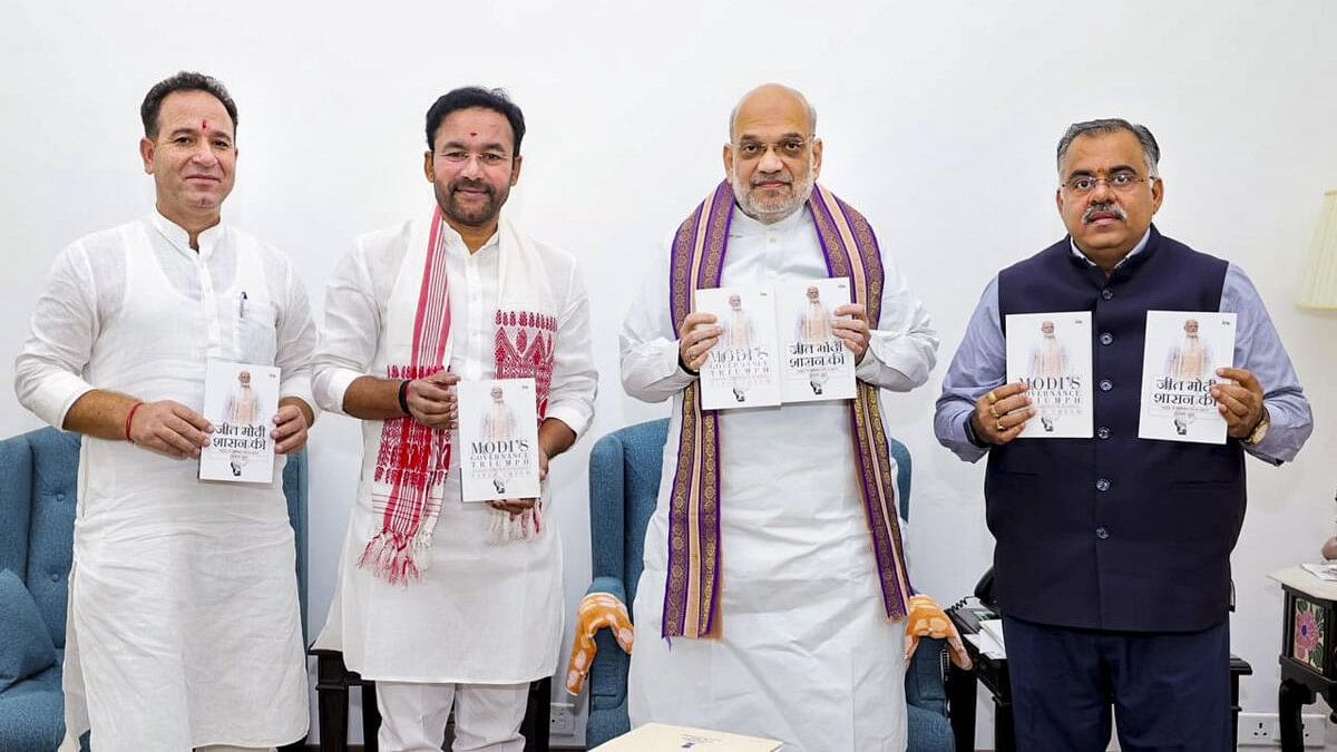 <div class="paragraphs"><p>Union Ministers Amit Shah, G Kishan Reddy and BJP National General Secretary Tarun Chugh during the release of Chugh's book <em>Modi's Governance Triumph: Reshaping India’s Path to Prosperity</em>.</p></div>