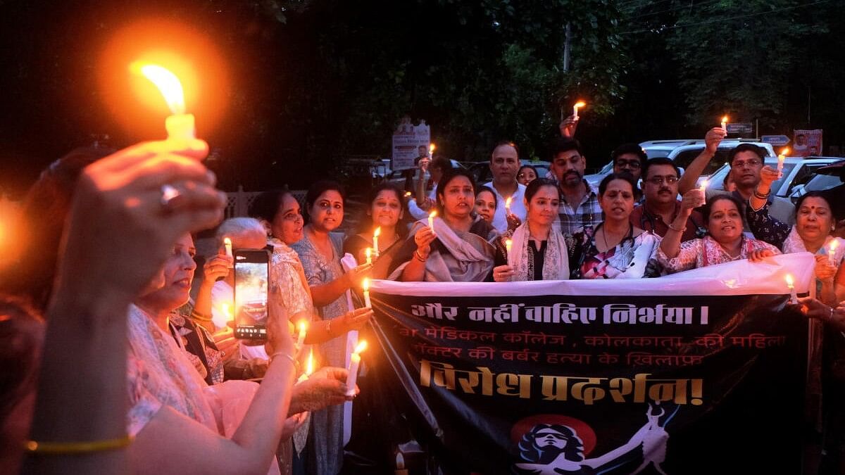 <div class="paragraphs"><p>Women stage a protest against the alleged rape and murder of a trainee doctor Kolkata's RG Kar Medical College and Hospital, in Gurugram.</p><p></p></div>