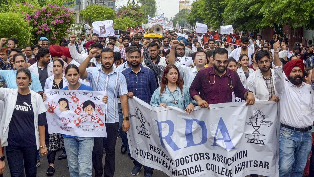 <div class="paragraphs"><p>Doctors and medical students stage a protest amid the 24-hour nationwide strike called by the Indian Medical Association (IMA) demanding justice for the woman doctor who was allegedly raped and murdered at Kolkata's R G Kar Medical College and Hospital.</p></div>