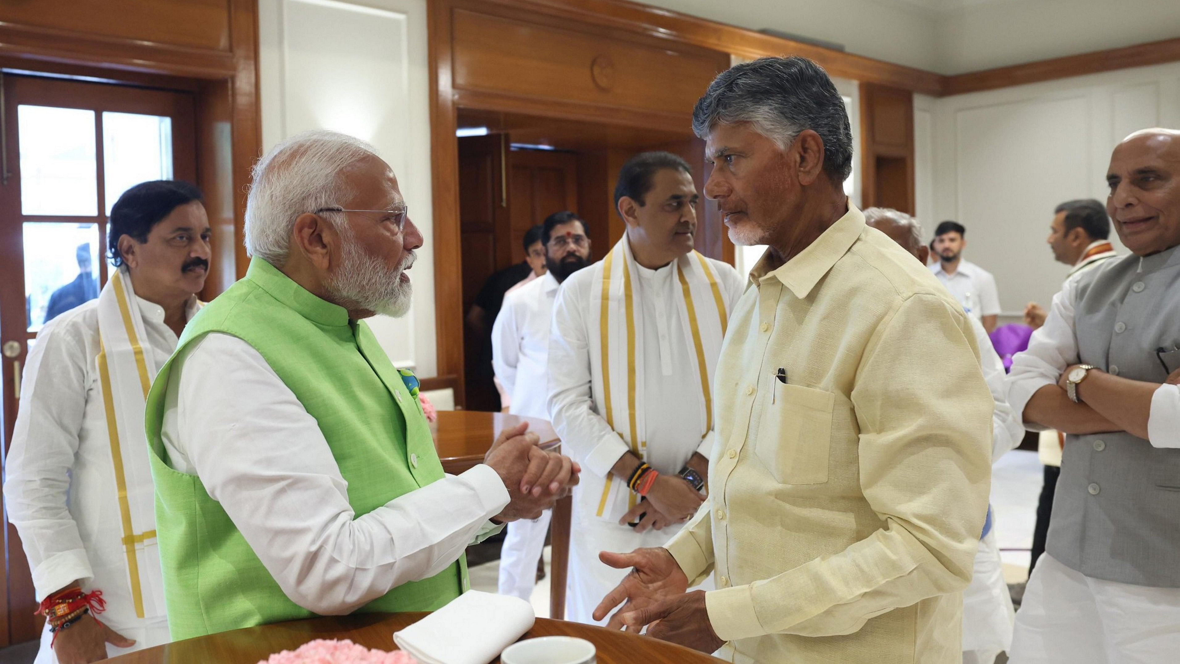 <div class="paragraphs"><p> Prime Minister Narendra Modi with TDP chief N Chandrababu Naidu during National Democratic Alliance (NDA) meeting at PM's residence, in New Delhi, Wednesday, June 5, 2024.</p></div>