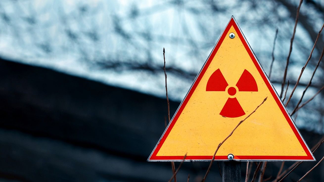 <div class="paragraphs"><p>Image showing a radiation hazard sign.</p></div>