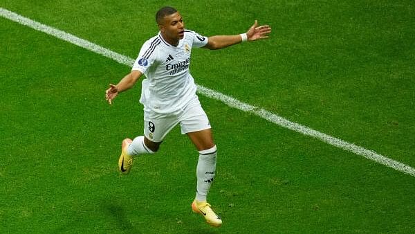 <div class="paragraphs"><p>Real Madrid's Kylian Mbappe celebrates scoring their second goal.</p></div>