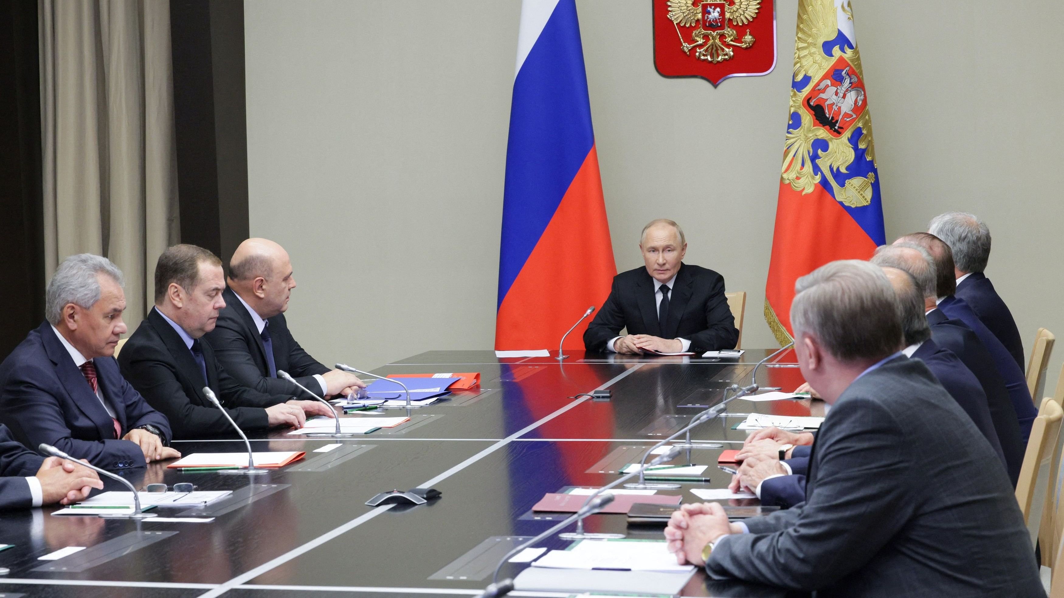 <div class="paragraphs"><p>Russia's President Vladimir Putin chairs a meeting with members of the Security Council at a residence outside Moscow, Russia.</p></div>