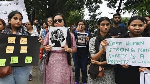 <div class="paragraphs"><p>Guwahati: People protest against against the alleged rape and murder of a trainee doctor at Kolkata’s RG Kar Medical College and Hospital, in Guwahati, Sunday, August 18, 2024. </p></div>