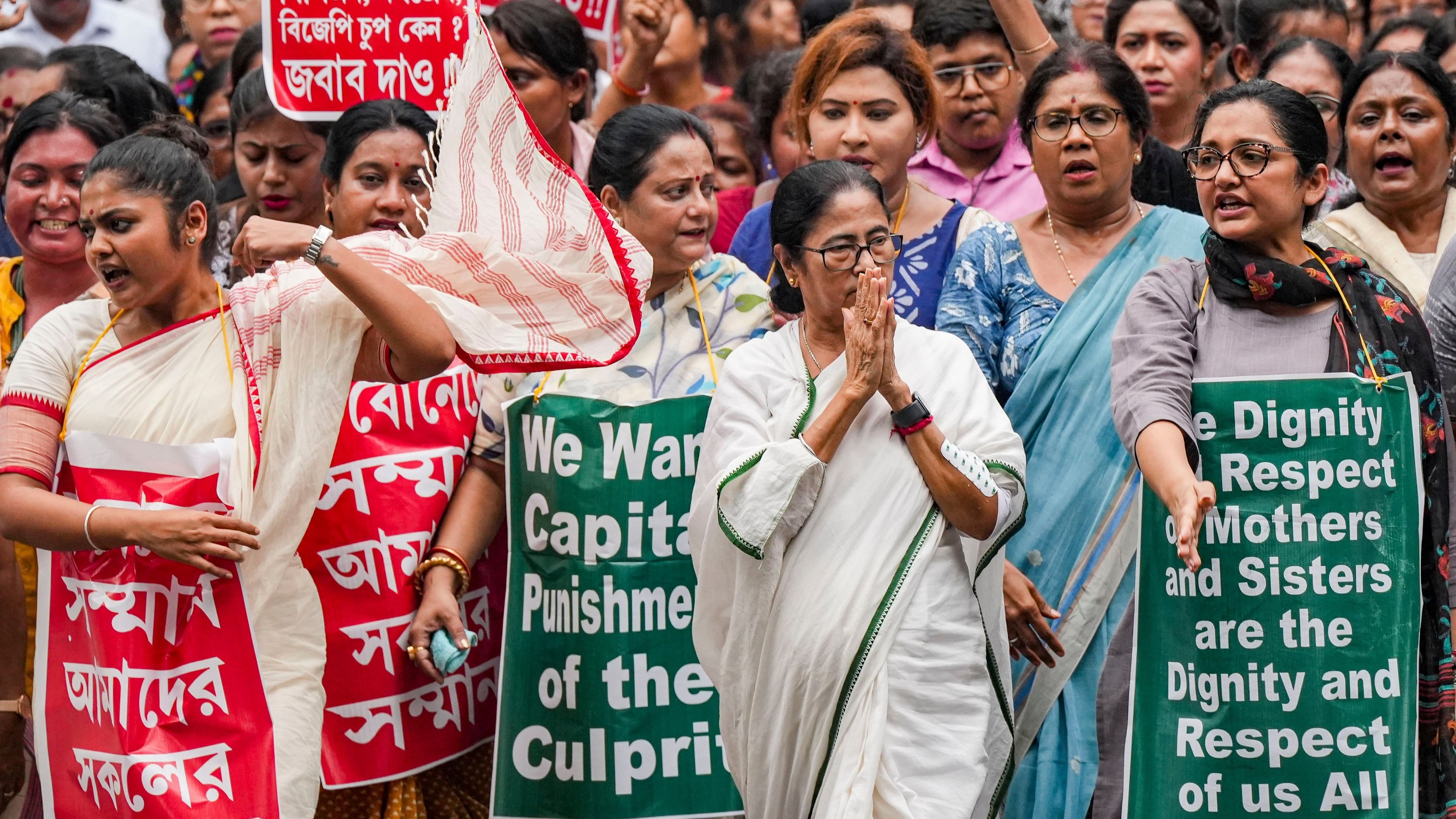 <div class="paragraphs"><p>West Bengal Chief Minister and TMC chief Mamata Banerjee along with party leaders and supporters takes part in a protest rally demanding justice for a woman doctor who was allegedly raped and murdered at R G Kar Medical College and Hospital, in Kolkata, Friday, August 16, 2024.</p></div>