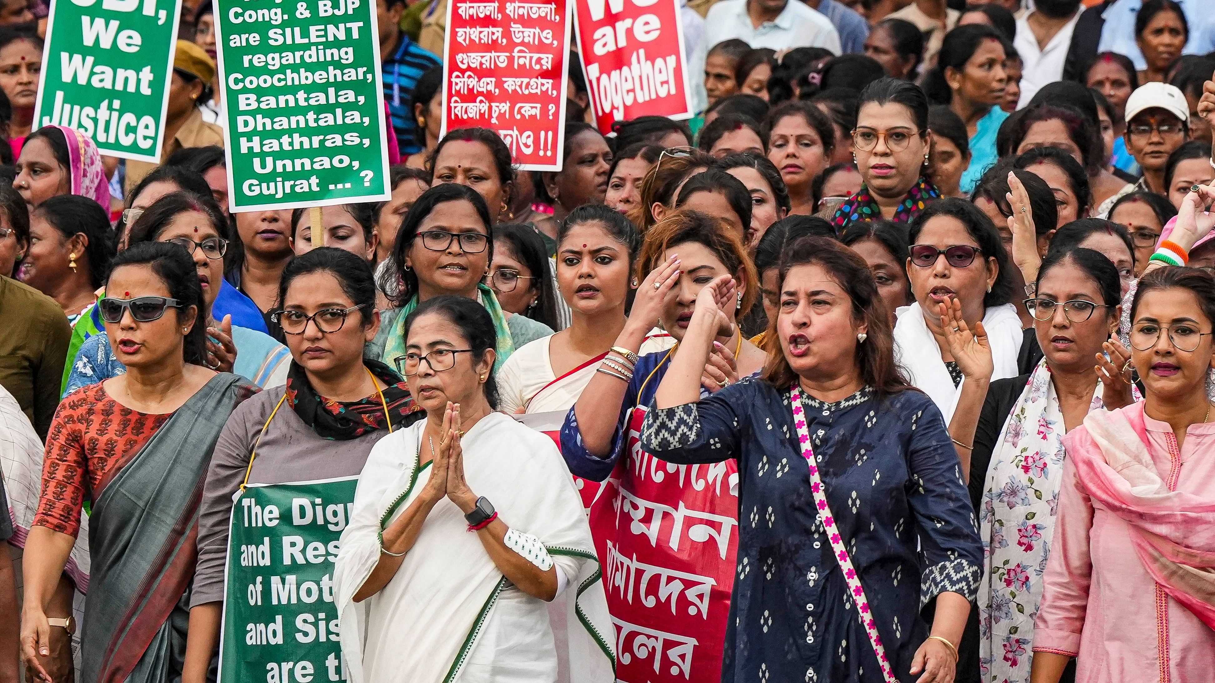 <div class="paragraphs"><p>Kolkata: West Bengal Chief Minister and TMC chief Mamata Banerjee along with party leaders and supporters takes part in a protest rally demanding justice for a woman doctor who was allegedly raped and murdered at R G Kar Medical College and Hospital, in Kolkata, Friday, August 16, 2024.</p></div>