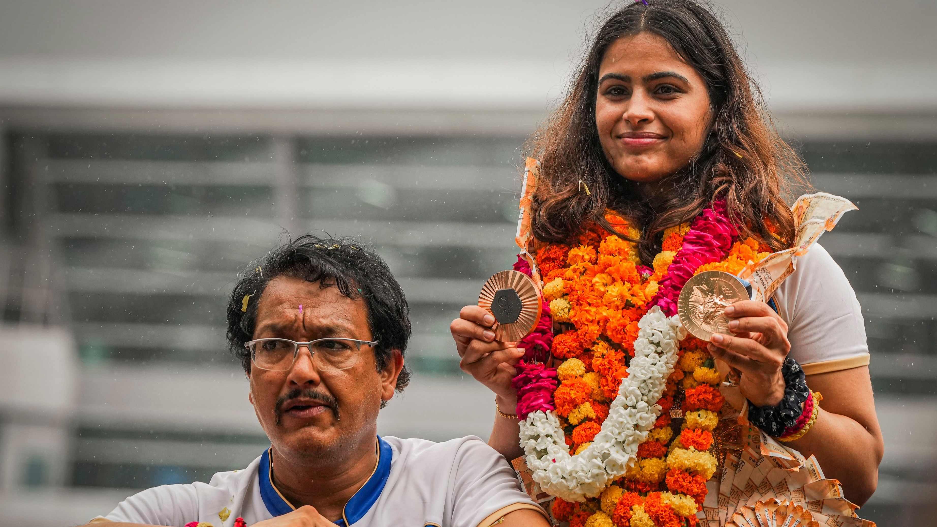 <div class="paragraphs"><p>Markswoman Manu Bhaker with her personal coach Jaspal Rana.</p></div>