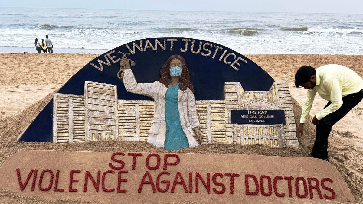 <div class="paragraphs"><p>Sand artist Sudarsan Pattnaik creates a sculpture on the recent alleged rape and murder of a trainee doctor at Kolkata's RG Kar Medical College and Hospital, at the beach in Puri.</p><p></p></div>