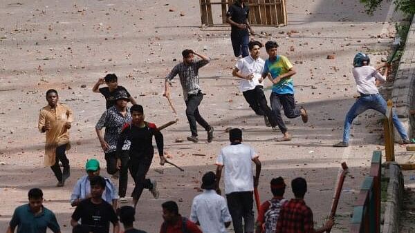 <div class="paragraphs"><p>Protesters seen at Dhaka college in July 2024.</p></div>