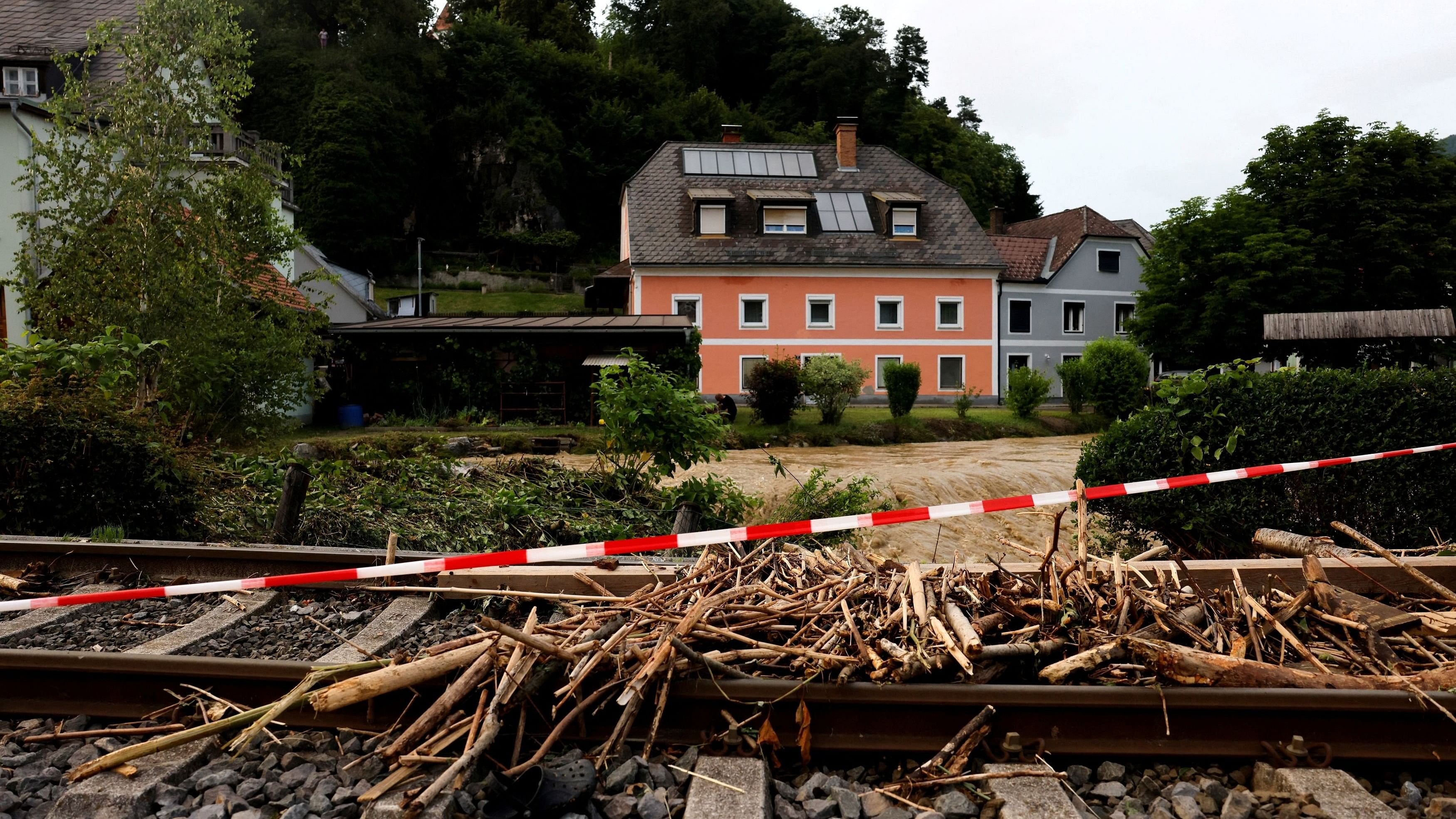 <div class="paragraphs"><p>Debris lies on railroad tracks as heavy rain causes floods and great damage in  Austria</p></div>