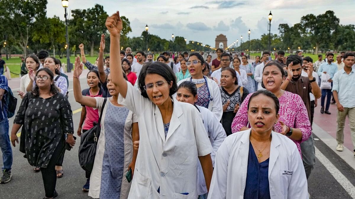 <div class="paragraphs"><p>Doctors, medical professionals and students in Delhi stage a protest march demanding justice for a woman doctor who was allegedly raped and murdered at Kolkata's R G Kar Medical College and Hospital.</p></div>