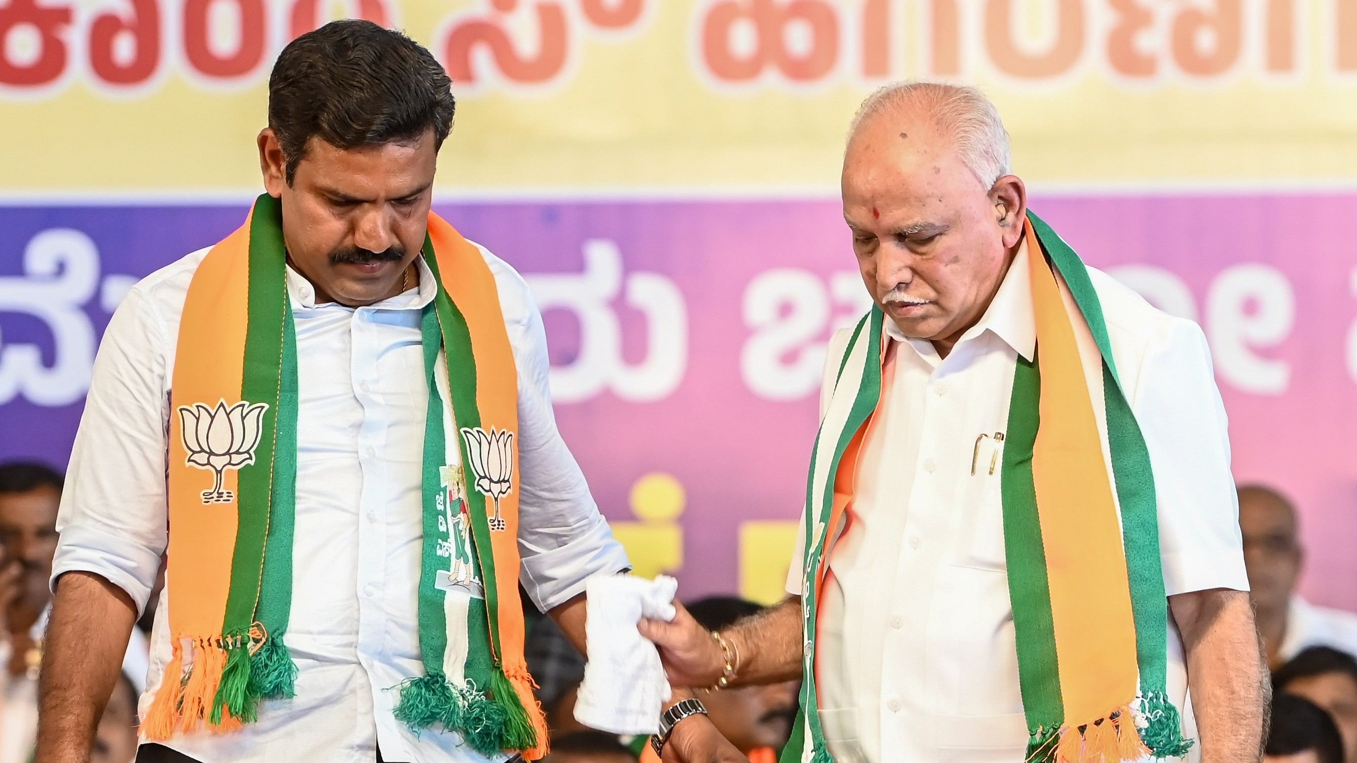 <div class="paragraphs"><p>BJP's B Y Vijayendra (left) is seen with his father and party veteran B S Yediyurappa.  </p></div>