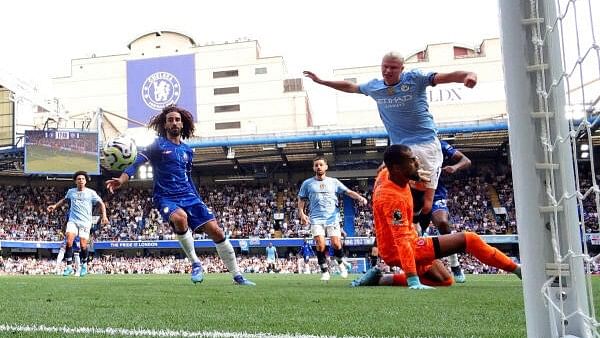 <div class="paragraphs"><p>Premier League - Chelsea vs Manchester City - Stamford Bridge, London, Britain - August 18, 2024: Manchester City's Erling Haaland scores their first goal.</p></div>