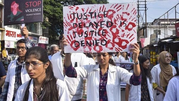 <div class="paragraphs"><p>Members of Indian Medical Association (IMA) take part in a protest march against the alleged sexual assault and murder of a postgraduate trainee doctor in Kolkata, in Karad.&nbsp;</p></div>