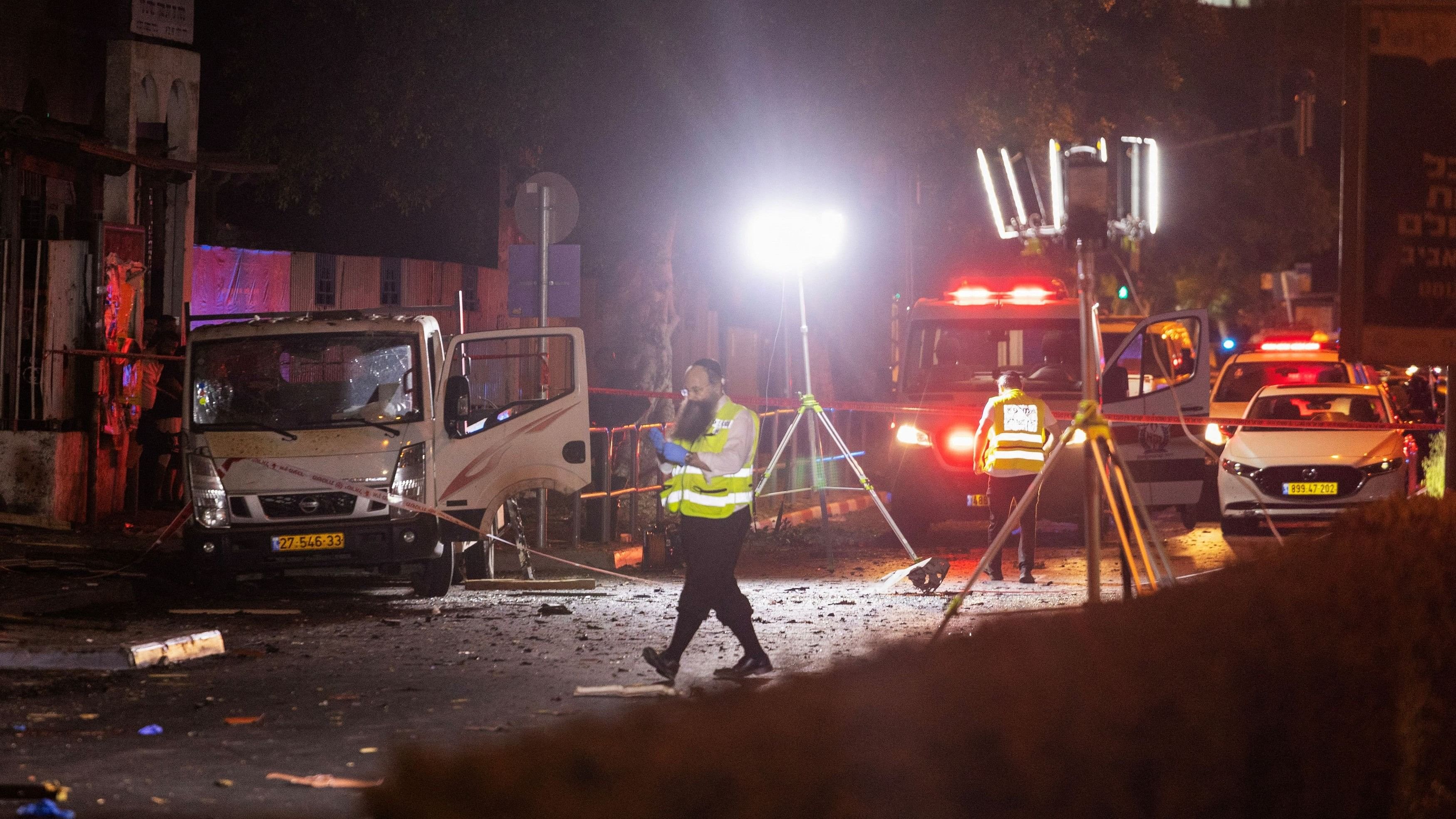 <div class="paragraphs"><p>Israeli security and emergency responders work at the site of a bomb blast in Tel Aviv, Israel August 18, 2024. </p></div>