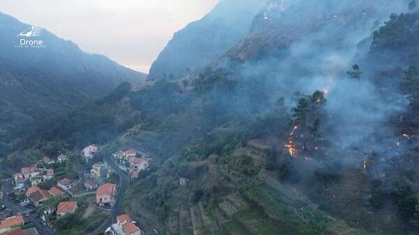 <div class="paragraphs"><p>A drone view shows smoke rising as vegetation burns amid a wildfire in the municipality of Ribeira Brava, Madeira, Portugal, in this screen grab taken from a video obtained from social media, August 18, 2024.</p></div>