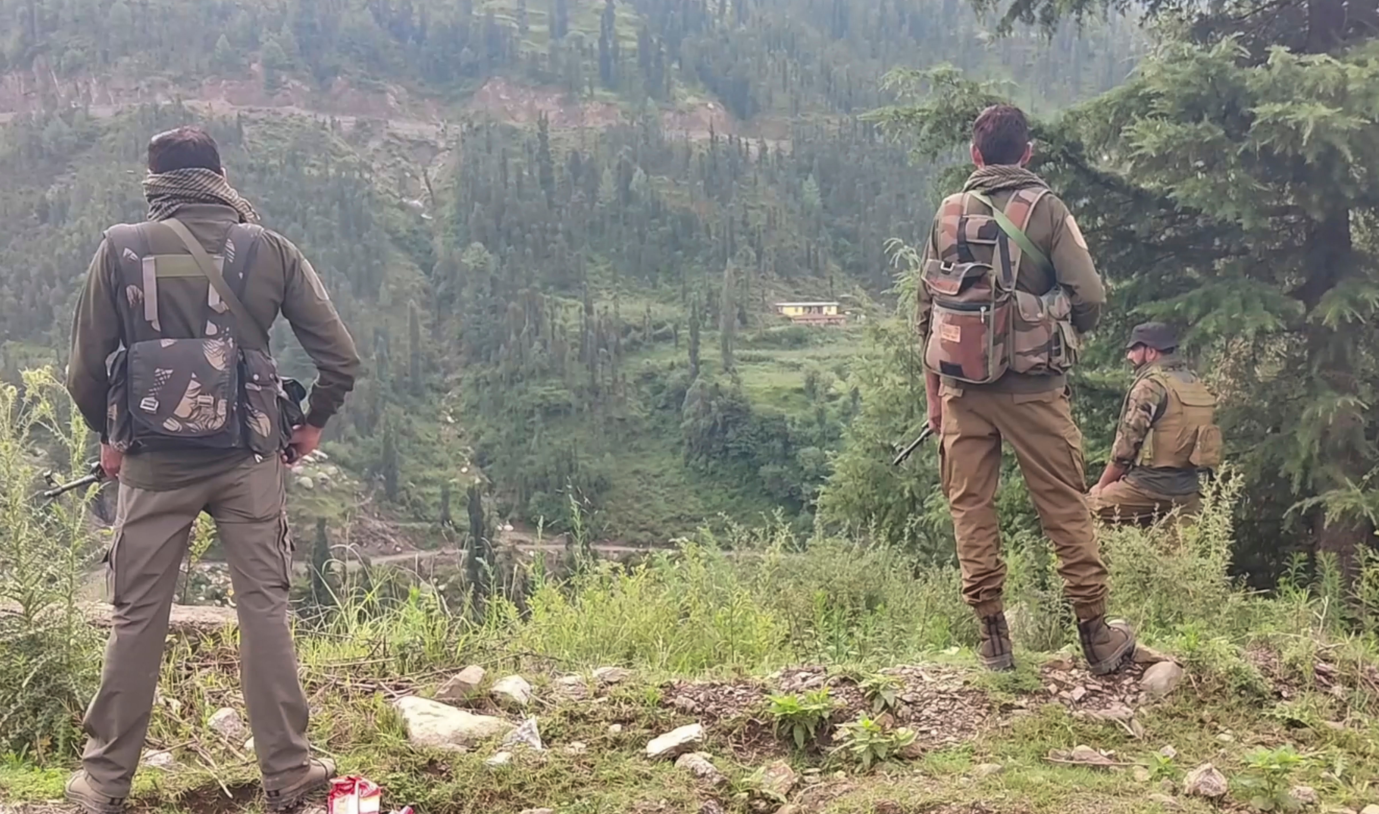 **EDS: SCREENSHOT VIA PTI VIDEOS** Udhampur: Security personnel during a search operation after a CRPF jawan was killed in a terrorist attack, in Udhampur, Tuesday, Aug. 20, 2024. (PTI Photo) (PTI08_20_2024_000074B)