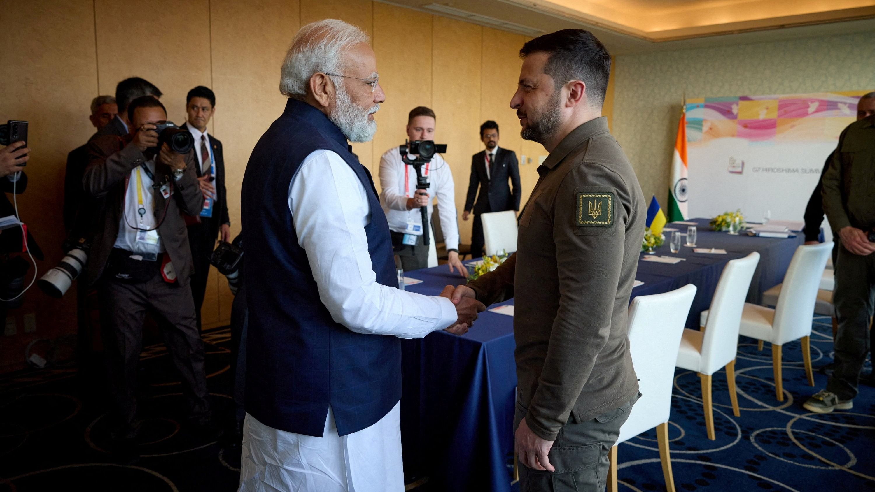 <div class="paragraphs"><p> Ukraine's President Volodymyr Zelenskiy and Indian Prime Minister Narendra Modi shake hands during the G7 leaders' summit in Hiroshima, Japan May 20, 2023. </p></div>