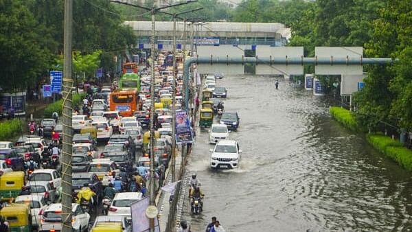 <div class="paragraphs"><p>Traffic jam on the waterlogged Vikas Marg after heavy monsoon rainfall, in New Delhi, Tuesday, Aug. 20, 2024.</p></div>