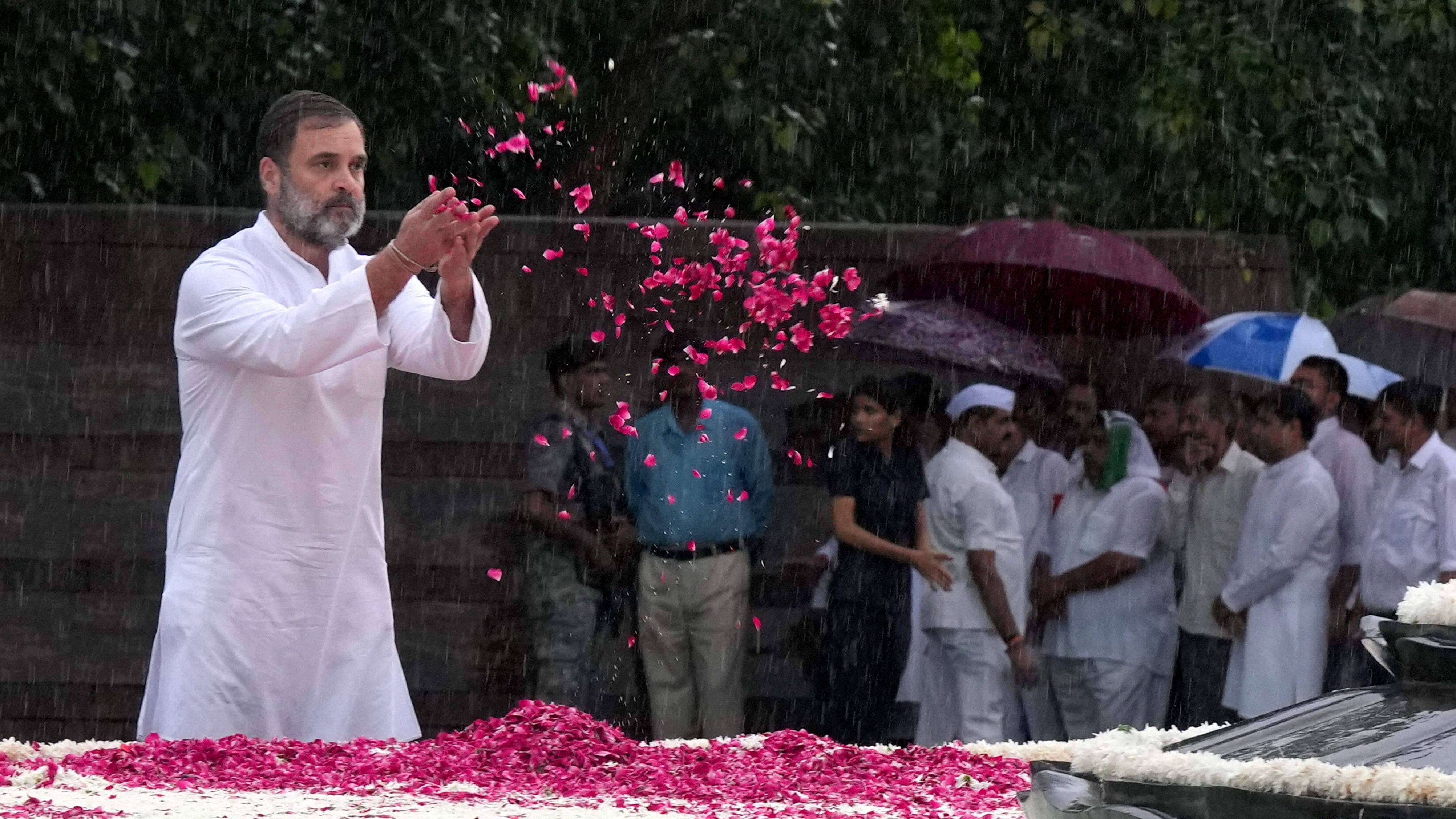 <div class="paragraphs"><p>Congress leader Rahul Gandhi pays tribute to former prime minister Rajiv Gandhi on his birth anniversary, amid monsoon rain, at Veer Bhumi in New Delhi, Tuesday, August 20, 2024.</p></div>