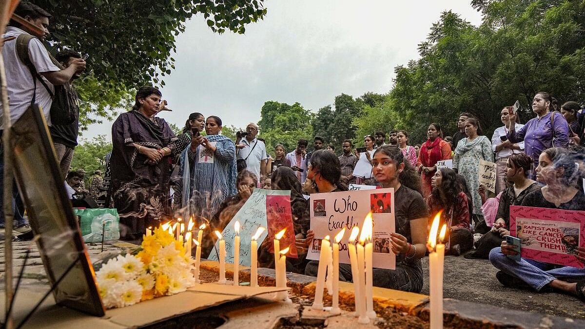 <div class="paragraphs"><p>Students stage a candlelight protest demanding justice for the woman doctor who was allegedly raped and murdered at Kolkata's R G Kar Medical College and Hospital.</p></div>