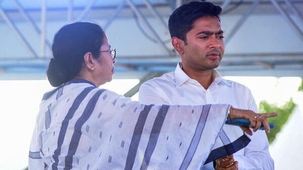 <div class="paragraphs"><p>Mamata with Abhishek Banerjee</p></div>