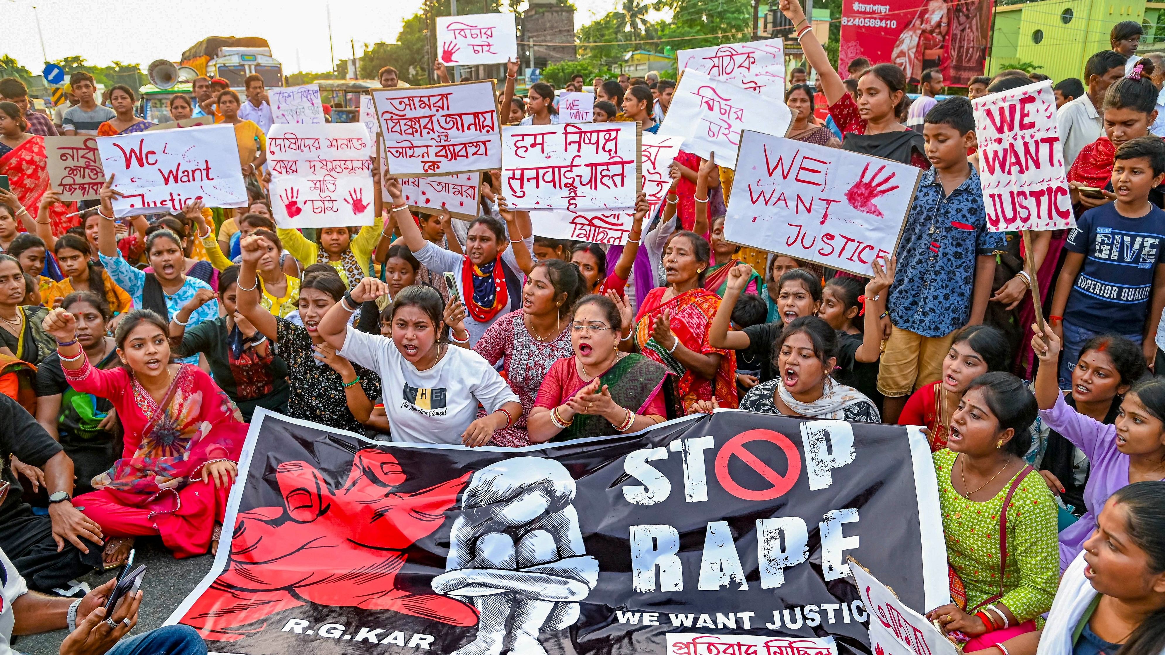 <div class="paragraphs"><p>People stage a protest demanding justice for the postgraduate trainee doctor who was raped and murdered at Kolkata's R G Kar Medical College and Hospital in Bengal's Nadia district.&nbsp;</p></div>