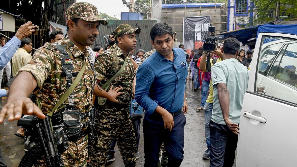 <div class="paragraphs"><p>A CBI official arrives to investigate the case of alleged sexual assault and murder of a postgraduate trainee doctor, at R G Kar Medical College and Hospital in Kolkata.</p></div>