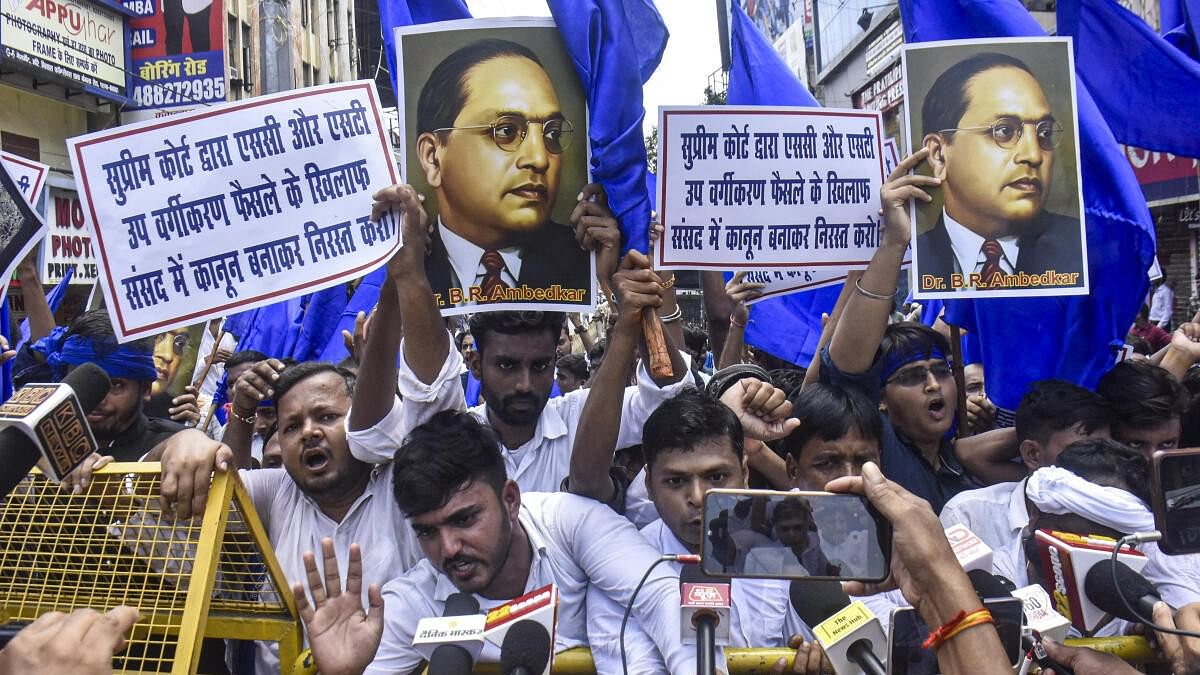 <div class="paragraphs"><p>BSP supporters and others protest against the Supreme Court's August 1 decision on the issue of SC-ST reservation during ‘Bharat Bandh’, in Patna, Wednesday, Aug. 21, 2024. </p></div>