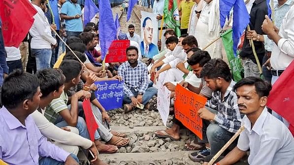 <div class="paragraphs"><p>Bhim Army supporters block railway tracks in support of the Bharat Bandh call over the recent Supreme Court ruling on SC/ST reservations, in Arrah, Thursday, Aug. 21, 2024.</p></div>