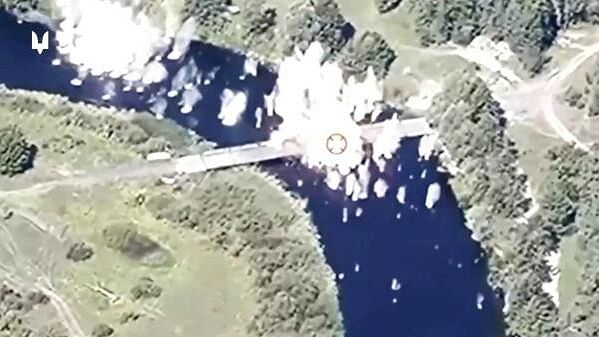 <div class="paragraphs"><p>A drone view shows what Special Forces of Ukraine say are strikes on crossings over the Seym river, near Glushkovo, Kursk Region, Russia, in this still image from handout video obtained on August 21, 2024. </p></div>