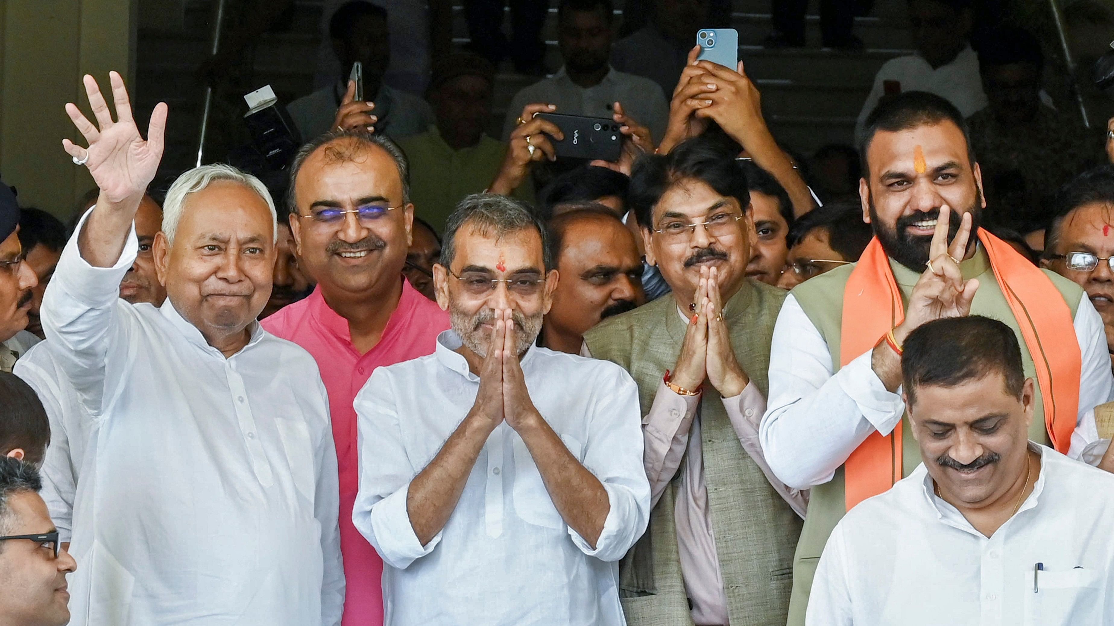 <div class="paragraphs"><p>Bihar Chief Minister Nitish Kumar with  NDA candidate Upendra Kushwaha and Manan Kumar Mishra after they filed nomination paper for Rajya Sabha election at Bihar Vidhan Sabha, in Patna.</p></div>