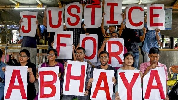 <div class="paragraphs"><p>Junior doctors stage a protest against the alleged sexual assault and murder of a postgraduate trainee doctor, at R.G. Kar Medical College and Hospital, in Kolkata</p></div>