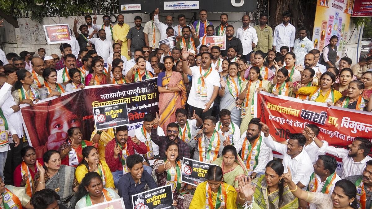 <div class="paragraphs"><p>NCP (SP) leader Supriya Sule and others during a protest over the Badlapur sexual abuse case, in Pune, Wednesday, August 21, 2024.</p></div>