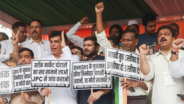 <div class="paragraphs"><p>Congress President Devender Yadav with party leaders Kanhaiya Kumar, Udit Raj and others during a ‘dharna’ demanding the resignation of Sebi chief Madhabi Buch, at Jantar Mantar, in New Delhi, Thursday, Aug. 22, 2024. </p></div>