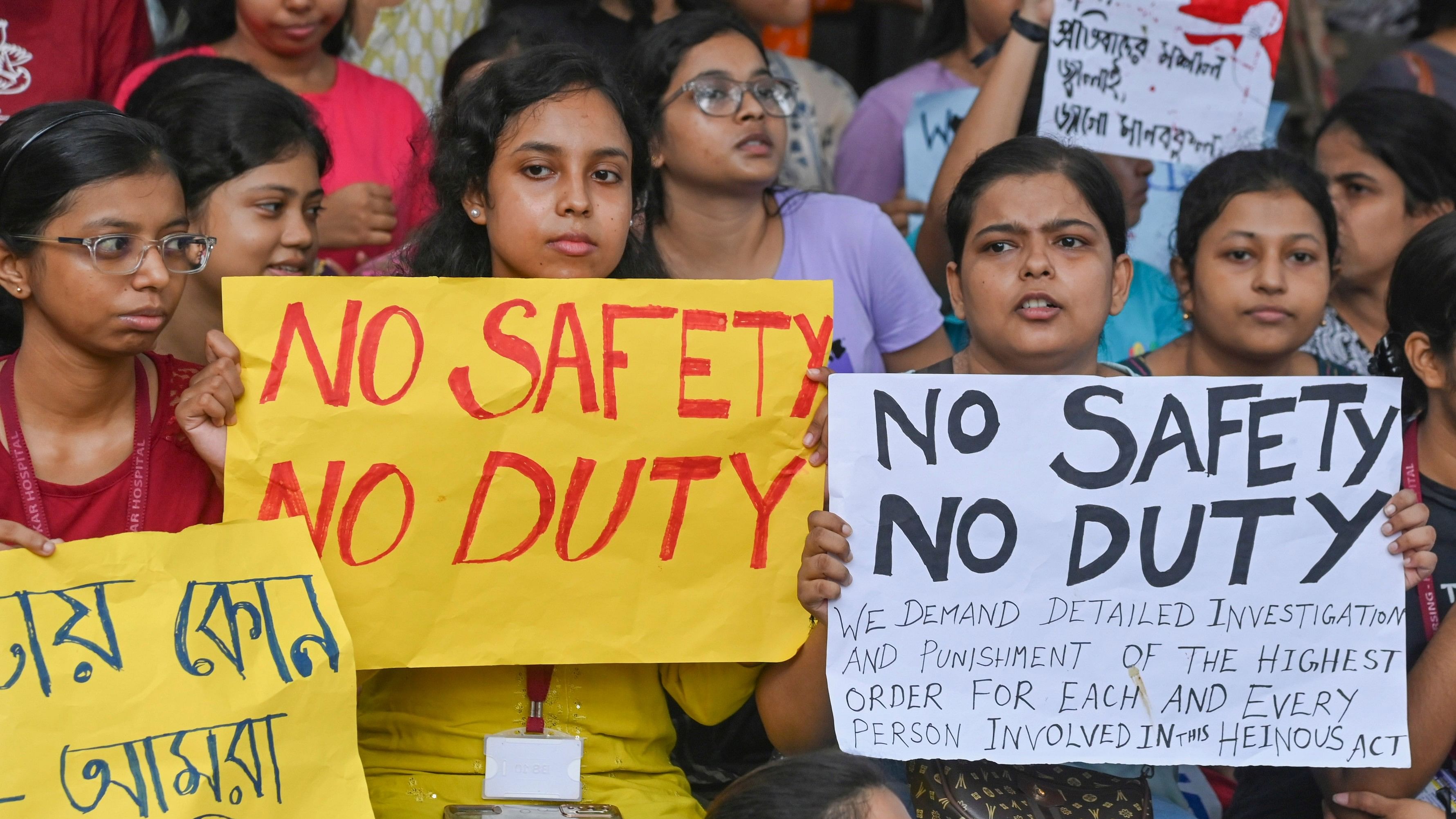 <div class="paragraphs"><p>Kolkata: Doctors and nursing staff protest against the recent the rape and murder of a woman doctor inside the RG Kar Medical College and Hospital, in Kolkata, Sunday, Aug. 11, 2024. Protests demanding quick punishment of those responsible for the rape and murder continued for the third day on Sunday, affecting services in government hospitals across West Bengal. </p></div>