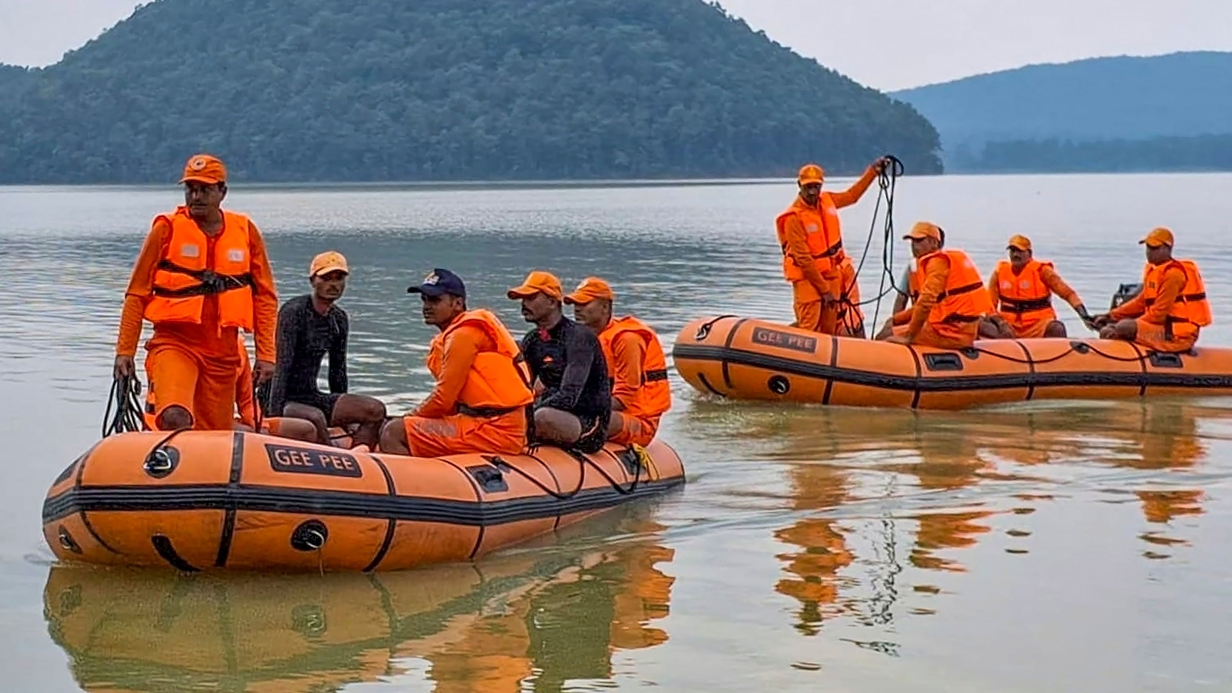 <div class="paragraphs"><p>NDRF personnel conduct a search operation to trace a missing pilot and a trainee pilot along with a two-seater aircraft that went missing after it took off from an aerodrome, in Seraikela-Kharswan district, Wednesday, Aug. 21, 2024. </p></div>