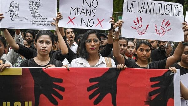 <div class="paragraphs"><p>Members of nightlife entertainment community take part in a protest march demanding justice for the postgraduate trainee doctor who was allegedly raped and murdered at R G Kar Medical College and Hospital, in Kolkata, Thursday, Aug. 22, 2024.</p></div>