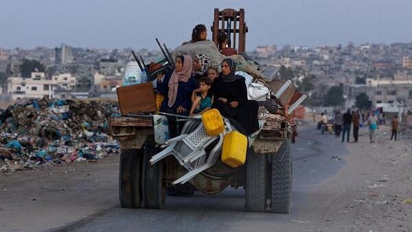 <div class="paragraphs"><p>Displaced Palestinians travel on a cart after fleeing the western part of Khan Younis, following an evacuation order by the Israeli army, amid Israel- Hamas conflict, in the central part of Khan Younis, in the southern Gaza Strip, August 21, 2024. </p></div>