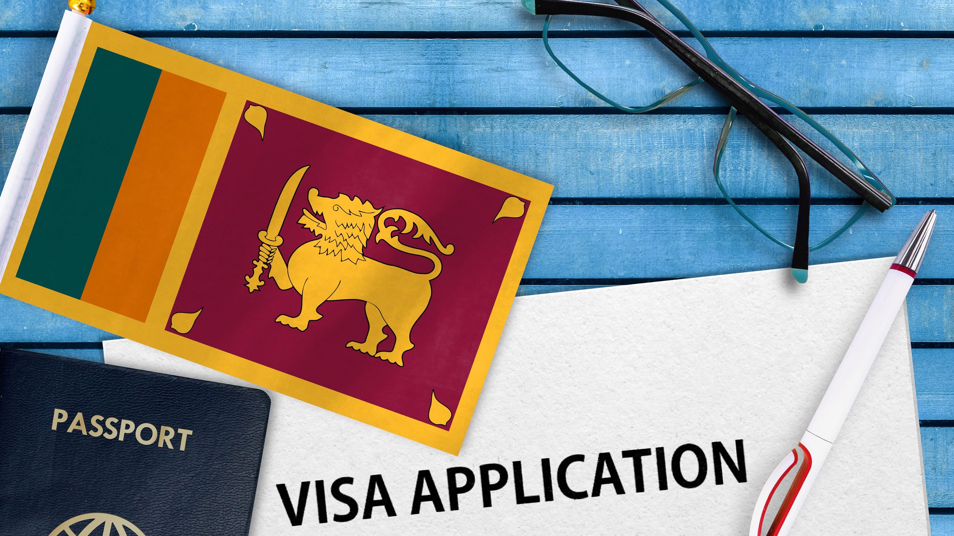 <div class="paragraphs"><p>Representative image of a Sri Lankan flag with a visa application.&nbsp;</p></div>