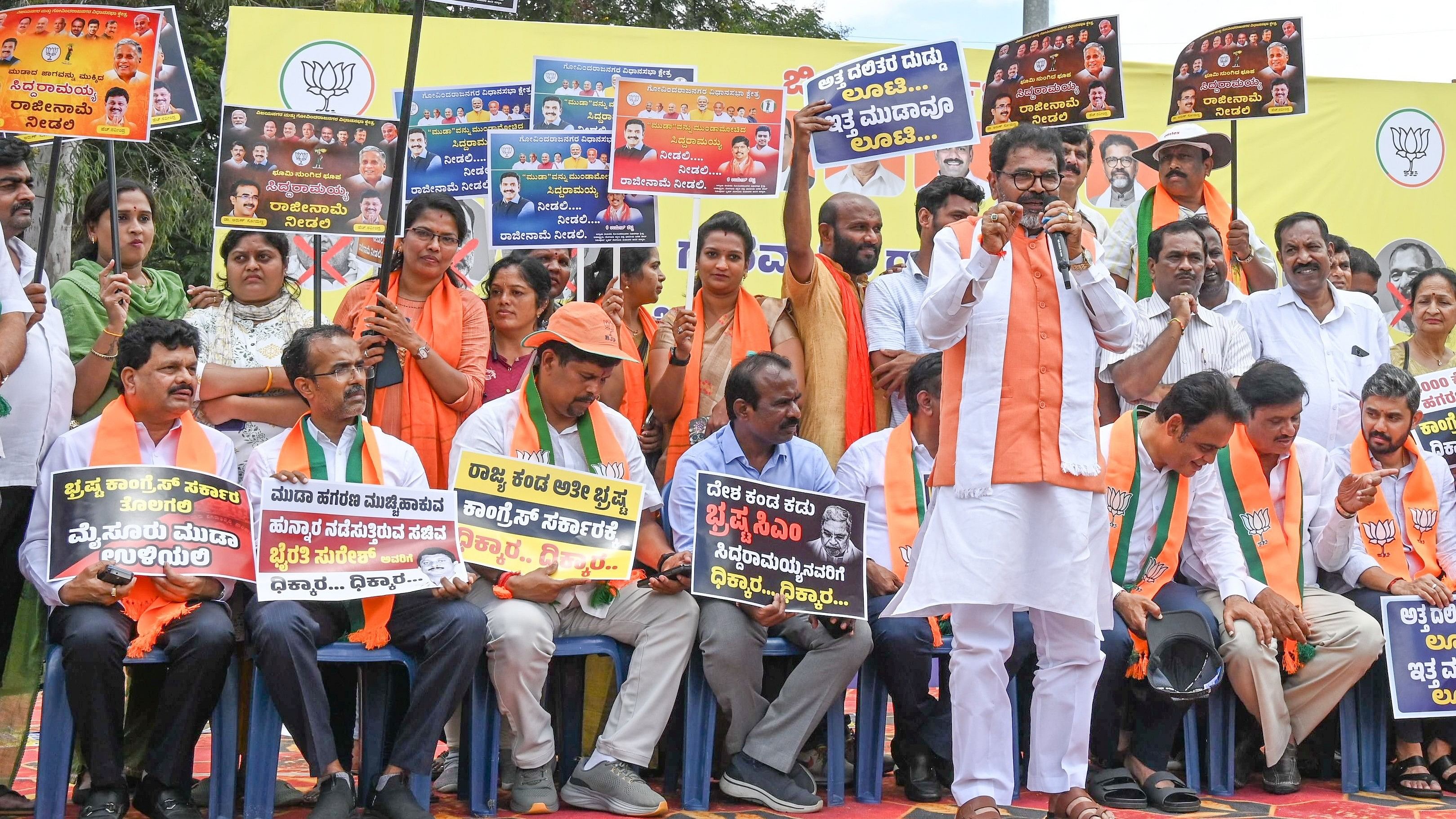 <div class="paragraphs"><p>Leader of the Opposition in the Legislative Council&nbsp;Chalavadi Narayanaswamy speaks at the BJP protest against the Congress for ‘insulting’ the governor, in Bengaluru on Thursday. </p></div>