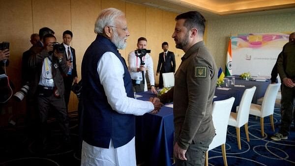 <div class="paragraphs"><p>Ukraine's President Volodymyr Zelenskiy and Indian Prime Minister Narendra Modi shake hands.&nbsp;</p></div>