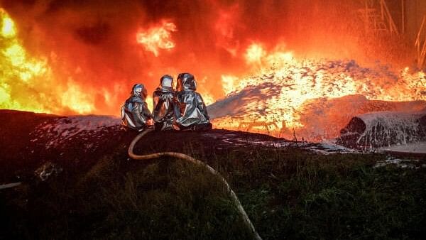 <div class="paragraphs"><p>Firefighters work at a site of an infrastructure facility hit by a Russian drone strike, amid Russia's attack on Ukraine, in Ternopil region, Ukraine August 20, 2024.  </p></div>