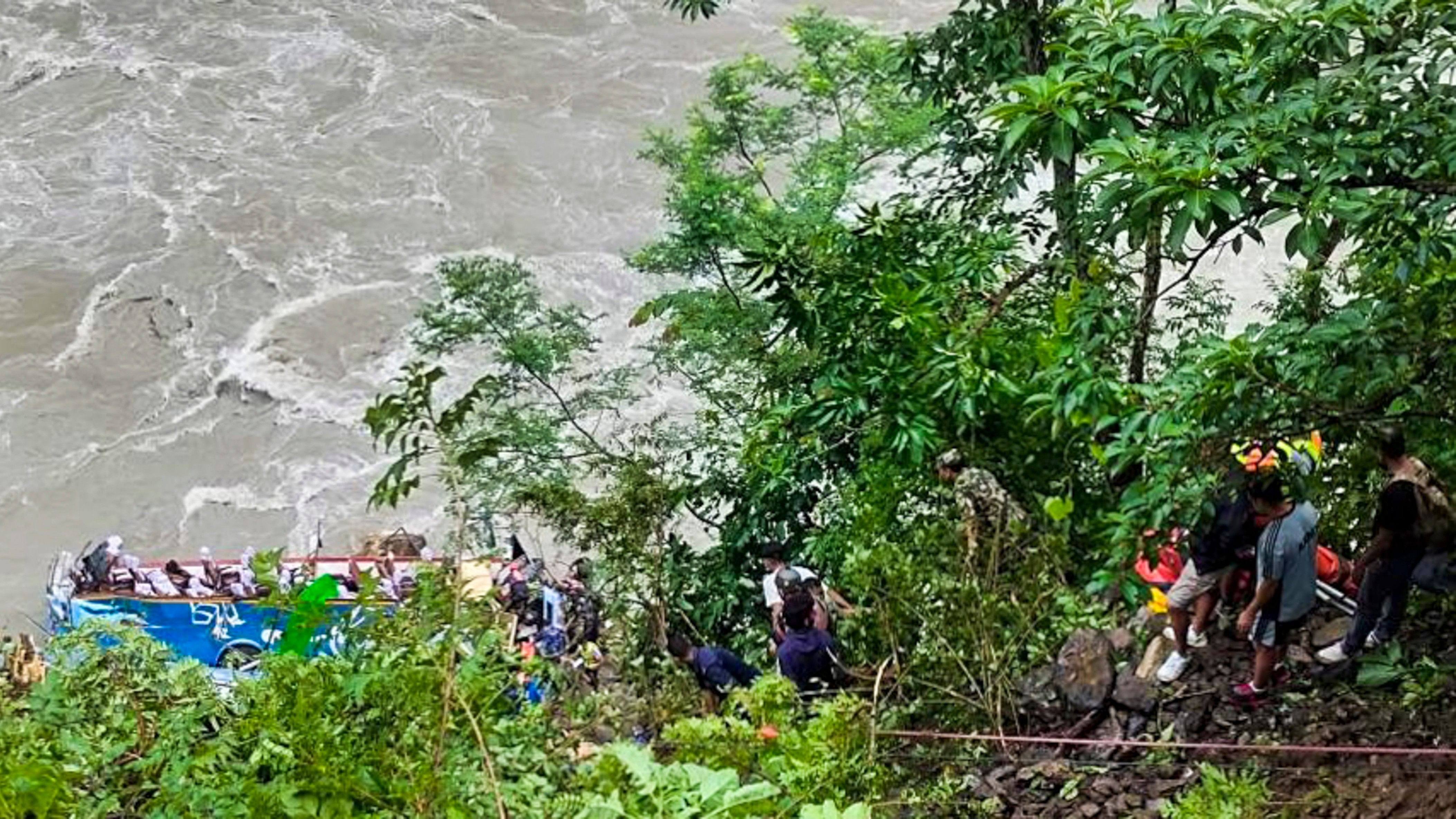 <div class="paragraphs"><p>Rescue work underway after an Indian number plate bus with 40 passengers coming from Pokhara to Kathmandu fell into the Marsyangdi river at Tanahun, Abu Khaireni, Nepal, Friday, Aug. 23, 2024. </p></div>