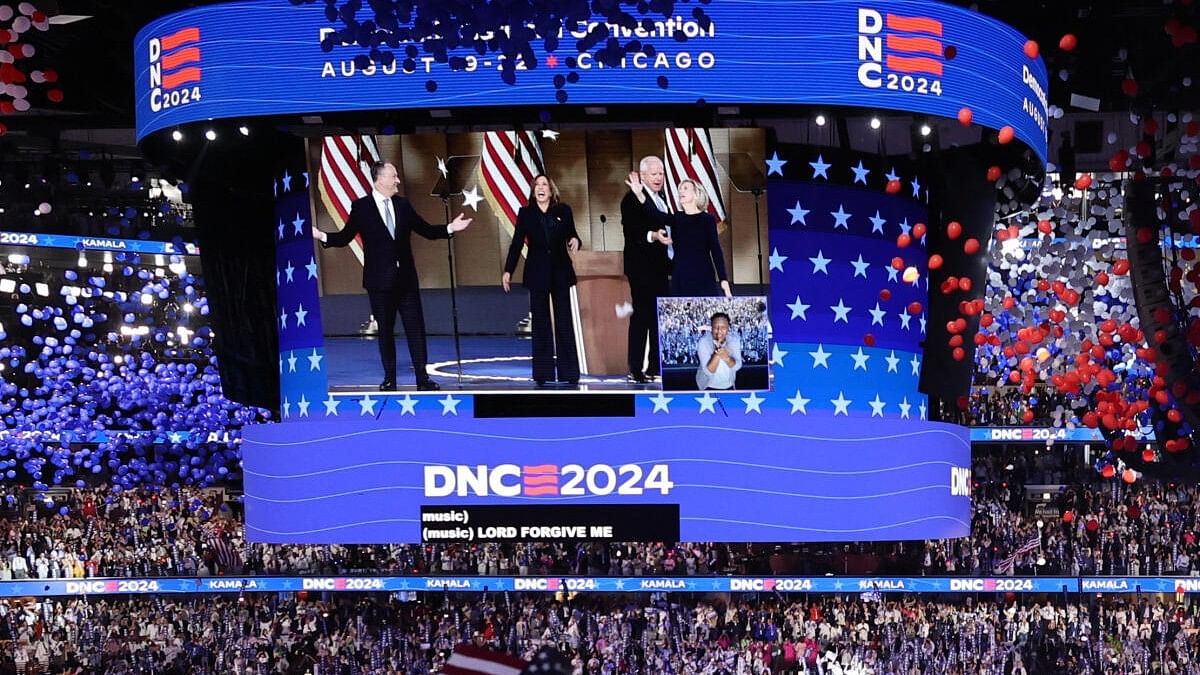 <div class="paragraphs"><p>Attendees cheer as Democratic presidential nominee and US Vice President Kamala Harris celebrates with her husband, second gentleman of the US Doug Emhoff, and vice presidential nominee Minnesota Governor Tim Walz and his wife Gwen, following her acceptance speech on Day 4 of the Democratic National Convention (DNC) at the United Center in Chicago, Illinois, US.</p></div>