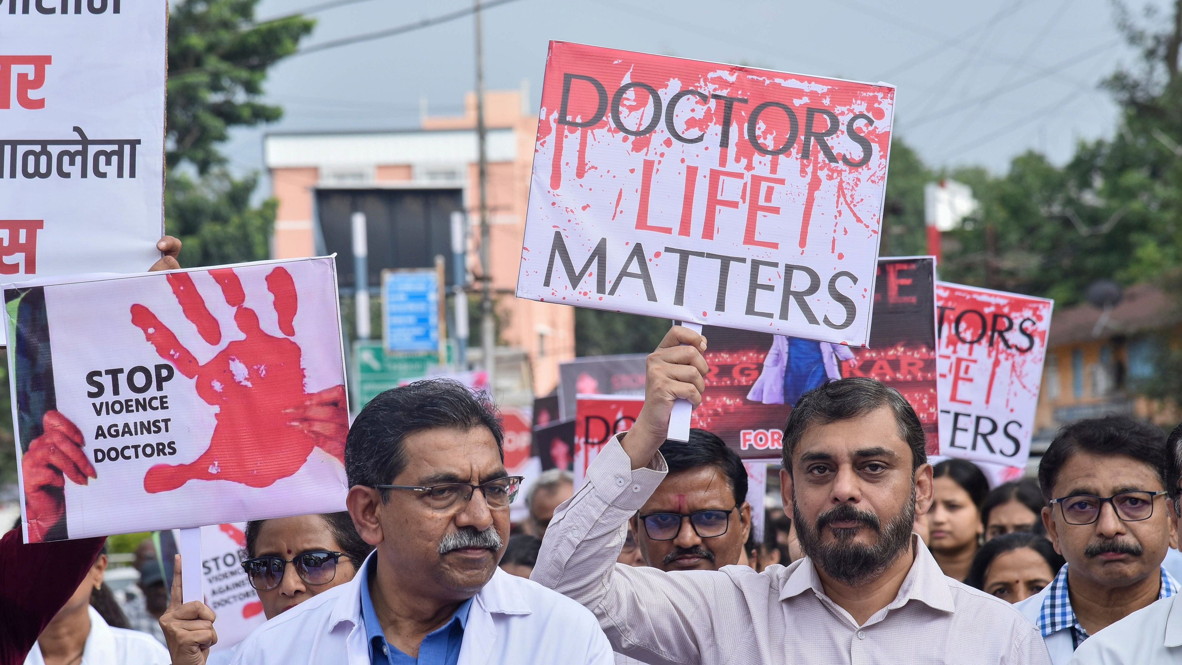 <div class="paragraphs"><p>Members of Indian Medical Association (IMA) take part in a protest march against the alleged sexual assault and murder of a postgraduate trainee doctor in Kolkata, in Karad.</p></div>