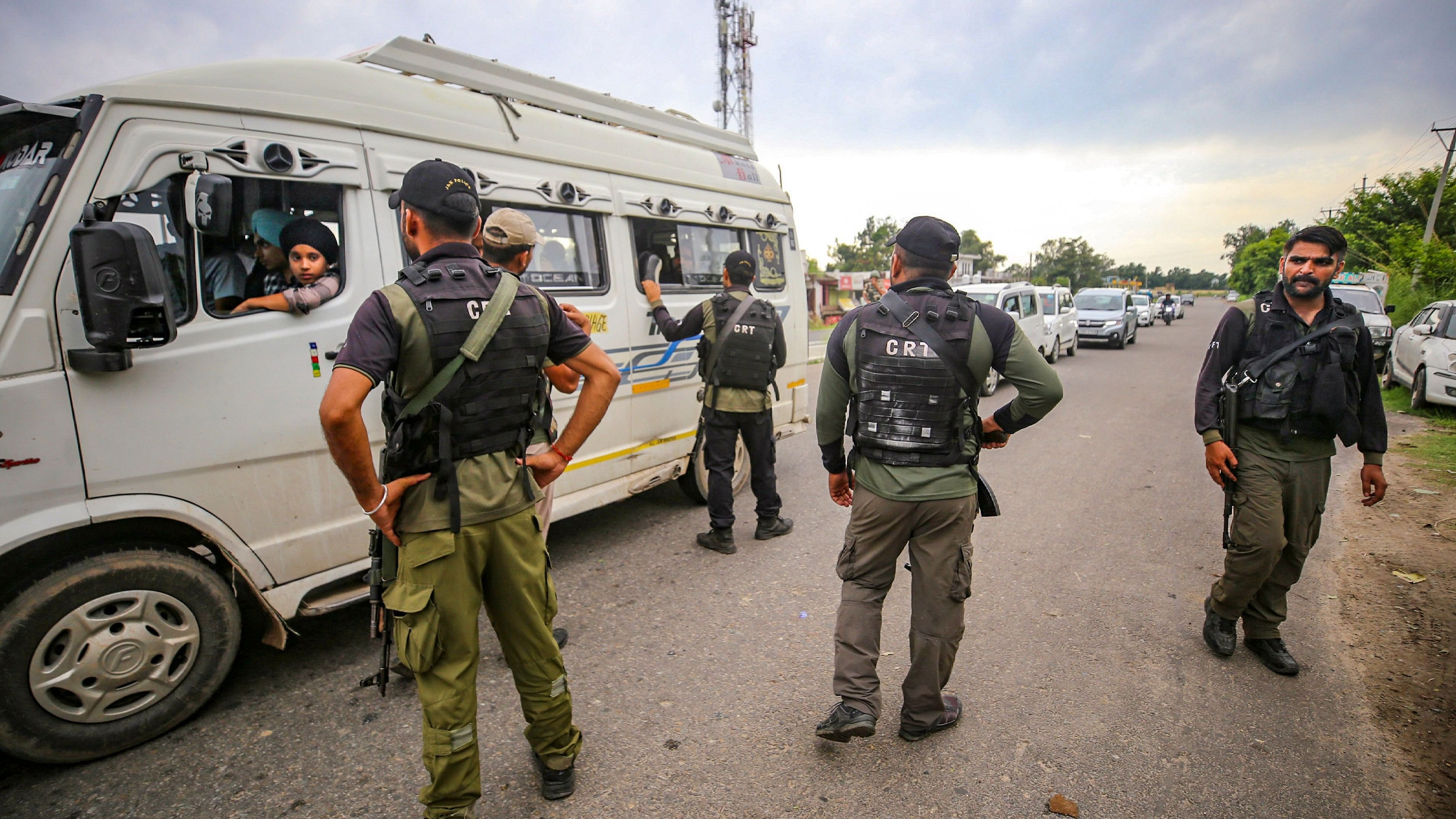 <div class="paragraphs"><p>Jammu: Jammu &amp; Kashmir Police's Crisis Response Team (CRT) personnel check a vehicle during a search operation.</p></div>