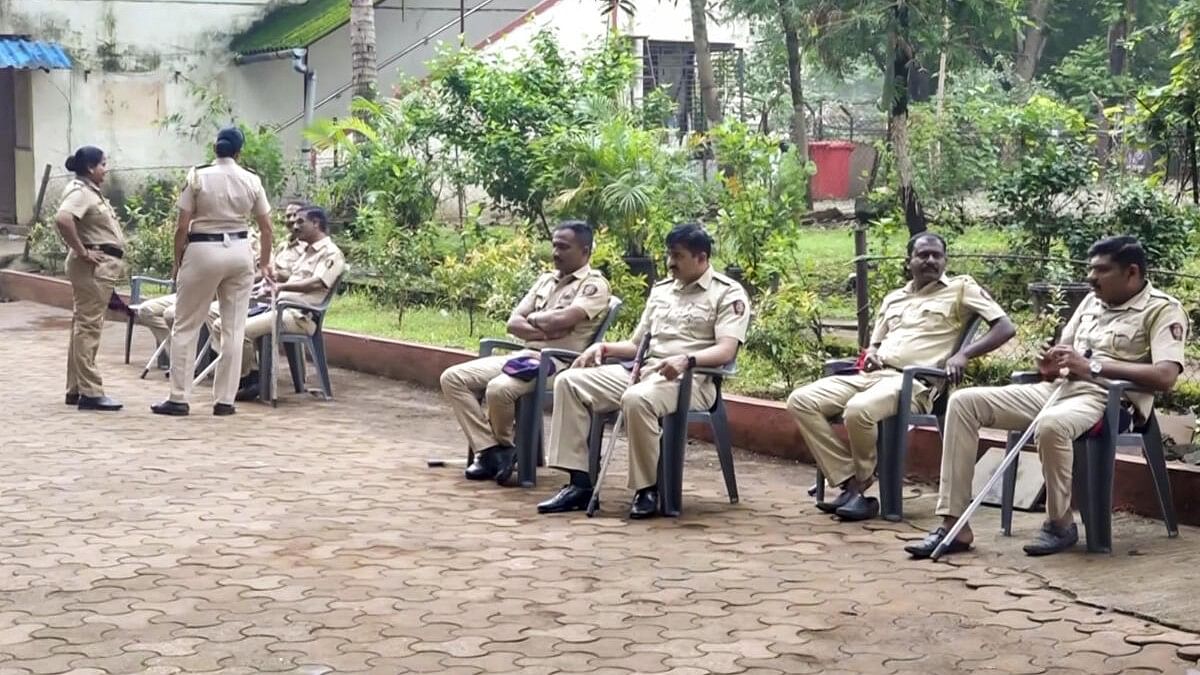 <div class="paragraphs"><p>Police personnel deployed at the school in Badlapur a day after massive protests over alleged molestation of two school girls, in Thane district.</p></div>